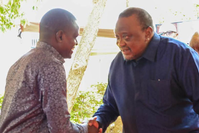 A file photo of former President Uhuru Kenyatta with Kiharu MP Ndindi Nyoro.